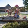 Gorilla slides on playground